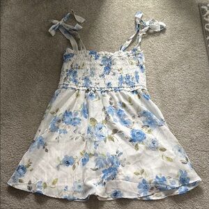 Altar’d State Blue and white floral smocked mini dress with tie straps
